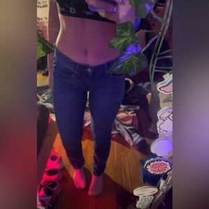 Dark blue skinny low rise jeans